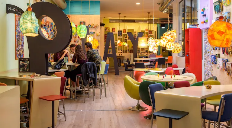 Playhouse board game café interior in Athens